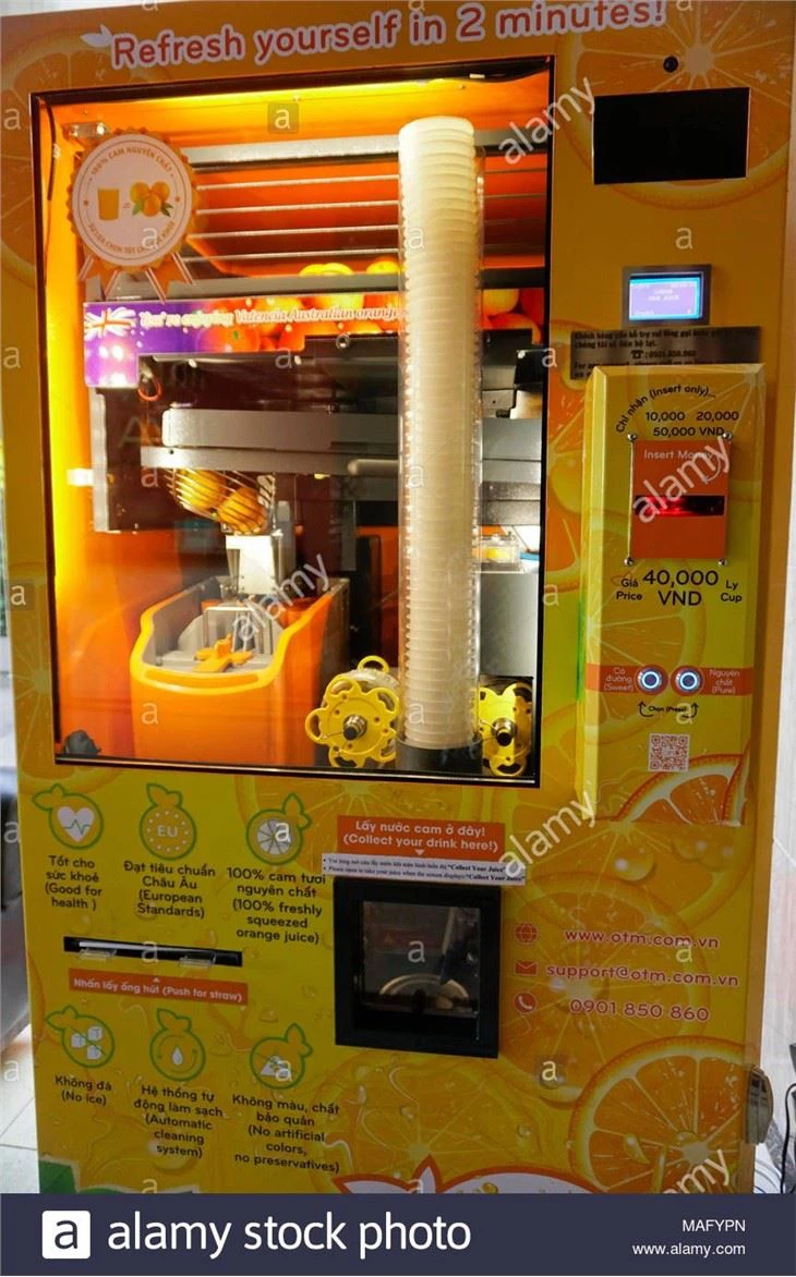 Fresh orange squeeze juice vending machine in Singapore and Vietnam